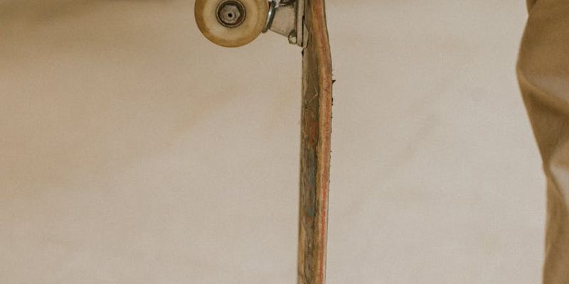 Close-up on a person's hands gripping the floor.